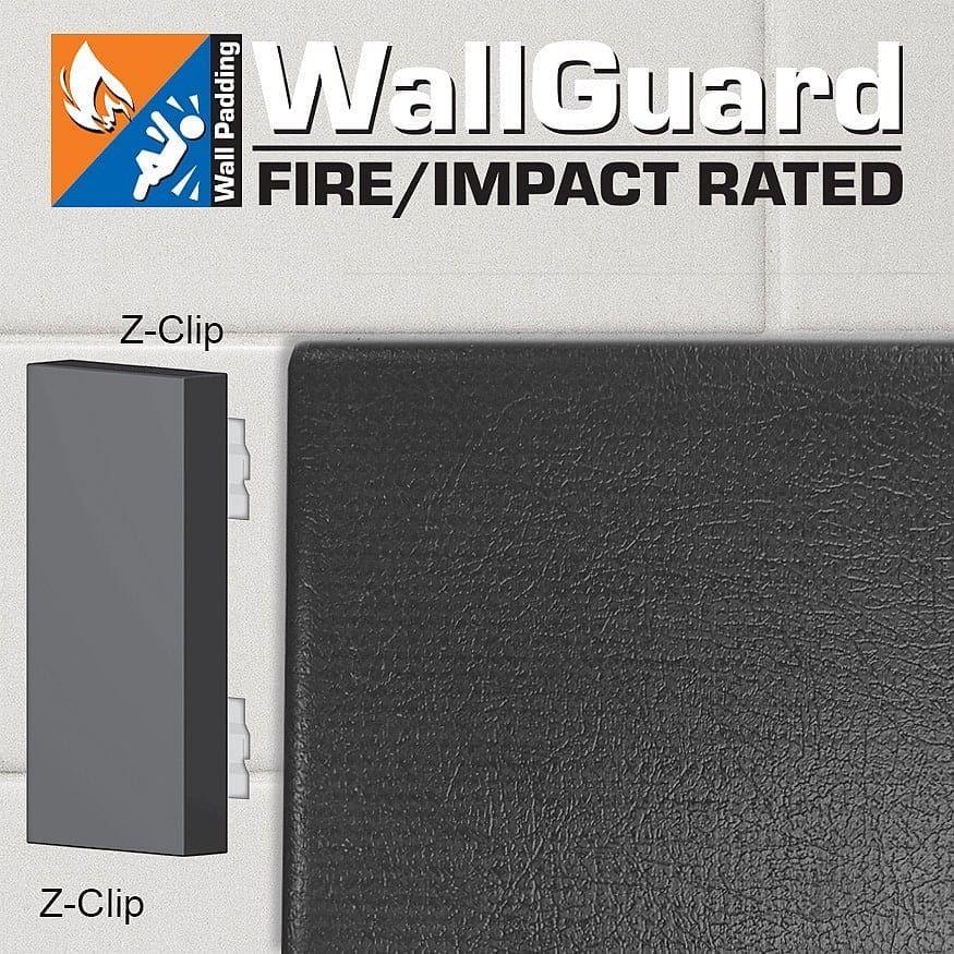 Jaypro WallGuard Fire/Impact Rated wall padding in white, installed on gym wall